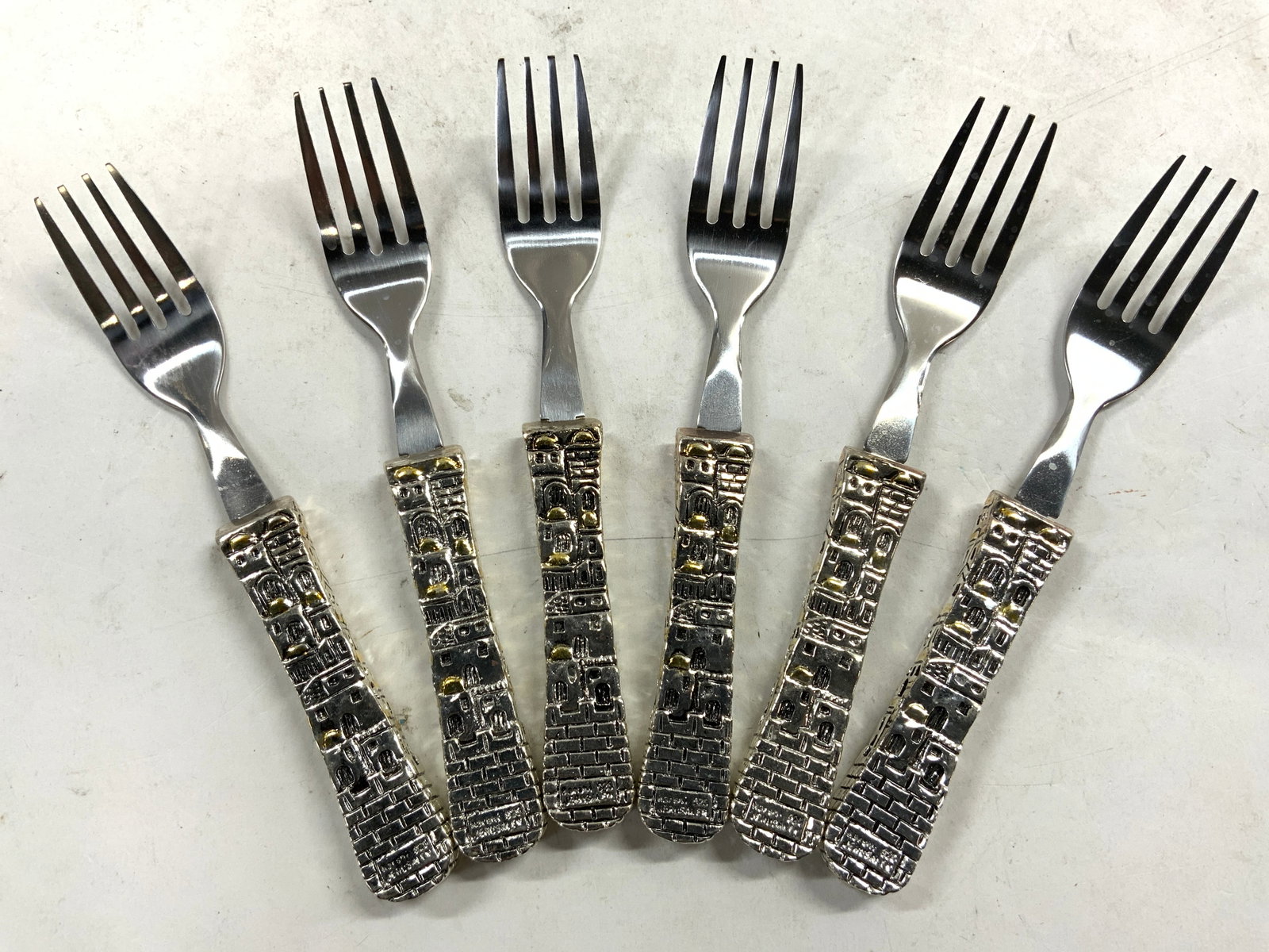KARSHI 6 Sterling Silver Handle Forks JERUSALEM: Base of fork handles are inscribed KARSHI 925 JERUSALEM. Each fork handle has architectural detail. Each fork has 4 prongs. Forks measure approx 6.25 inches long, .85 inches wide. Weight approx 0.94 O