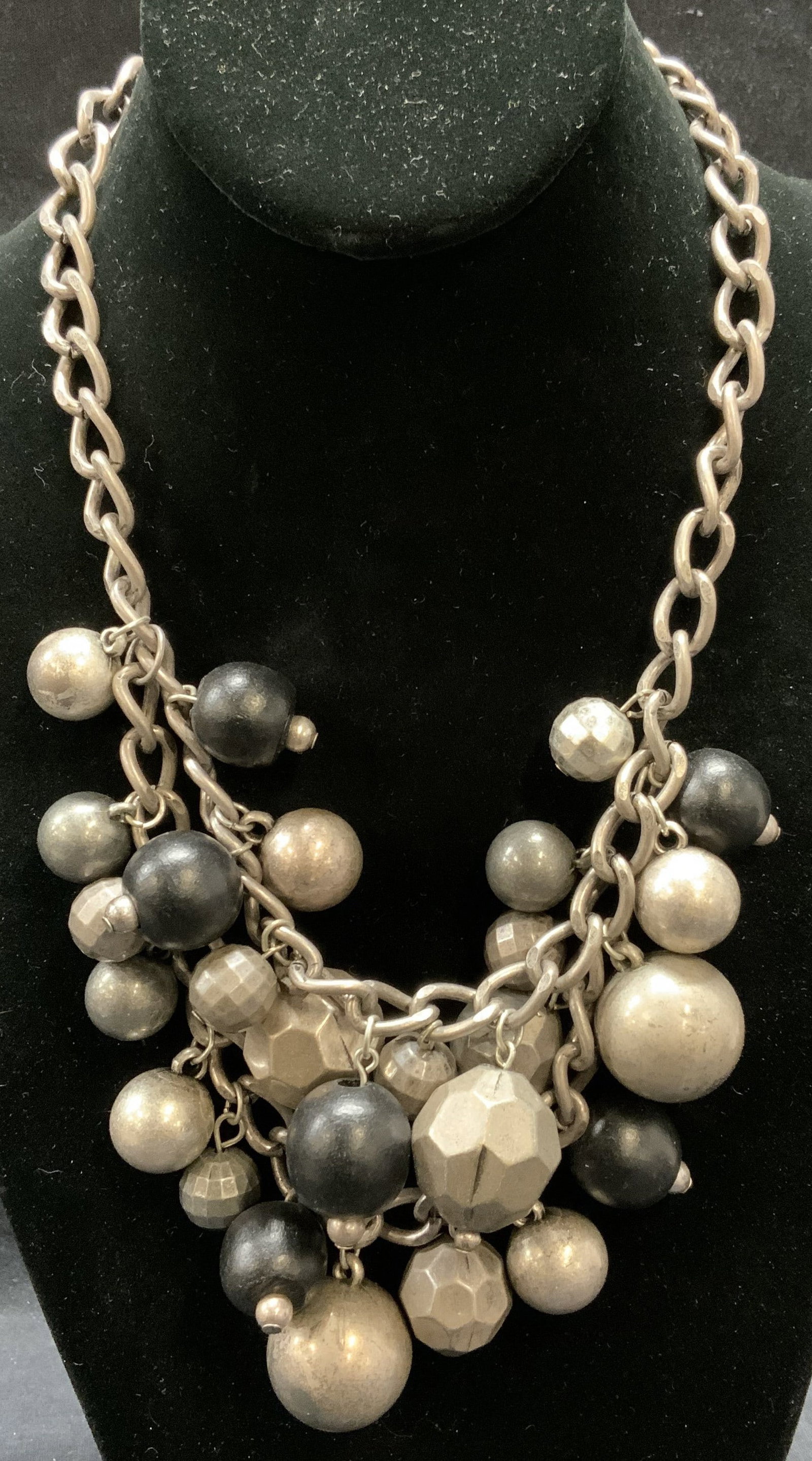 Silver Tone Beaded Statement Necklace: Silver tone statement necklace with black and silver tone beads. Drop length approx. 10 inches. Surface wear including scratching and loss to finish observed. Estate jewelry, costume jewelry, cocktail