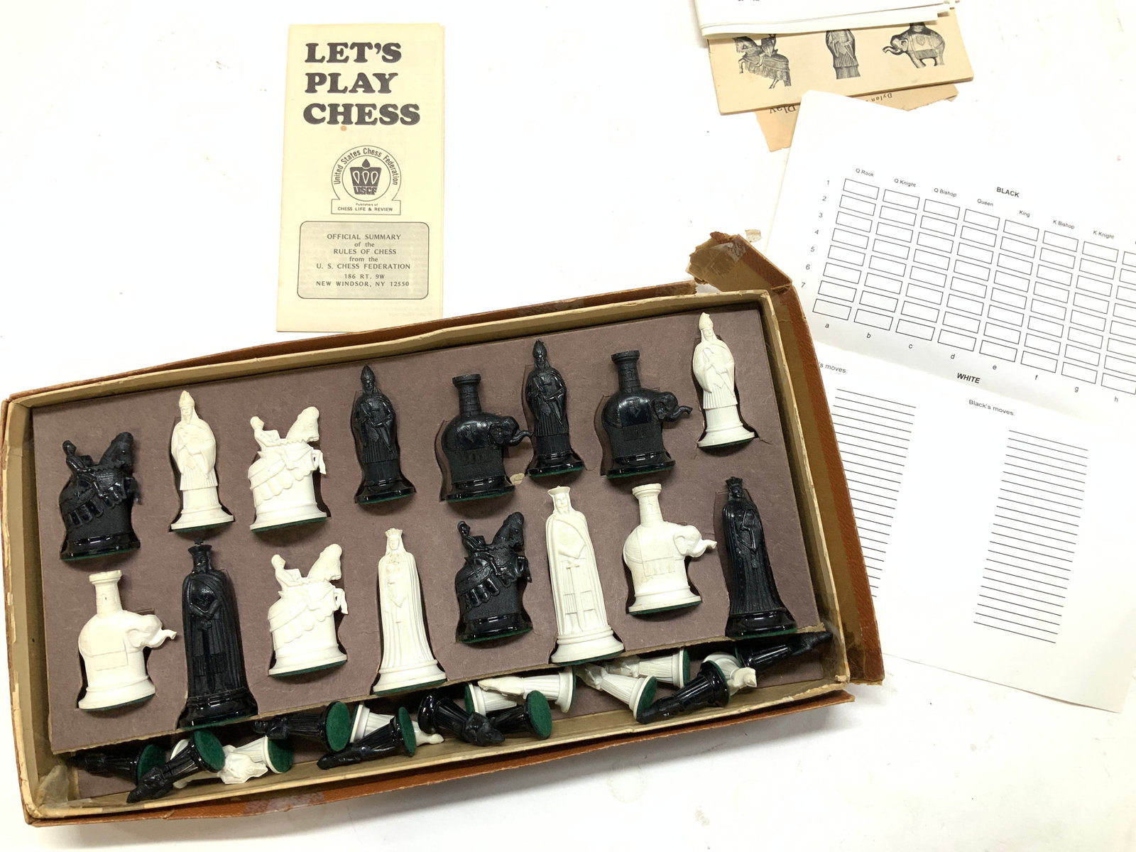 Vintage Kingsway Florentine Chessman Pieces, 32: The Royal Game of Chess Kingsway Florentine Chessmen Pieces, c.1974, original instruction booklet. Green felt underneath er the pieces. Complete set of player’s pieces. Tallest 3.25 in. No board. Or