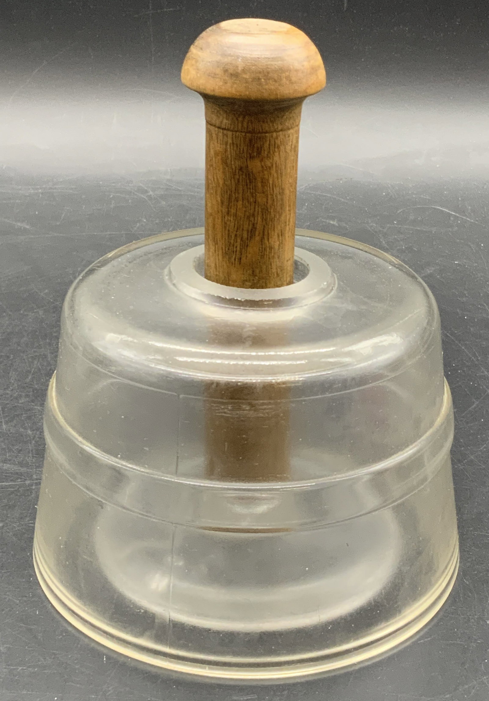 Antique Glass & Wood Cow Butter Mold: Vintage, possibly antique, glass and wood cow butter mold. Impressed cow figure to the underside. Measures approx. 5H x 4.5W in. Bubbles and seams present in glass. Some wear consistent with age, use,