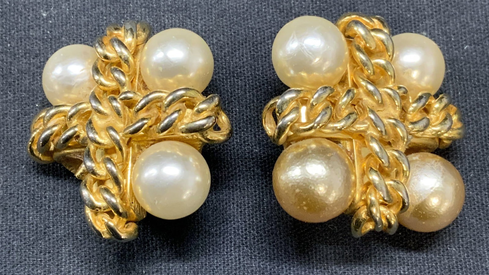 DAVID DUBIN Gold Tone Faux Pearl Earrings: Vintage David DUBIN gold tone faux pearl clip on earrings. One faux pearl needs replacement. Signed to underside DUBIN NR. Measure approx. 1.5 inches wide. Surface wear including scratching and holes 