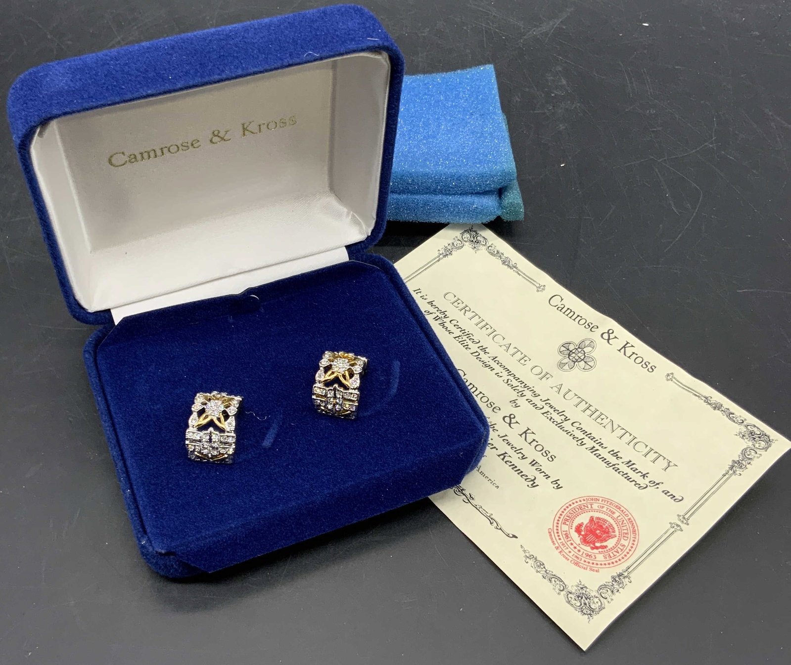Camrose & Kross JBK Crystal Cuff Earrings, Org Box: Vintage Camrose & Kross Jacqueline Kennedy Collection crystal cuff earrings crafted from gold tone metal, possibly 24K gold plate. Faceted colorless Swarovski crystals encrust the obverse. Post backin