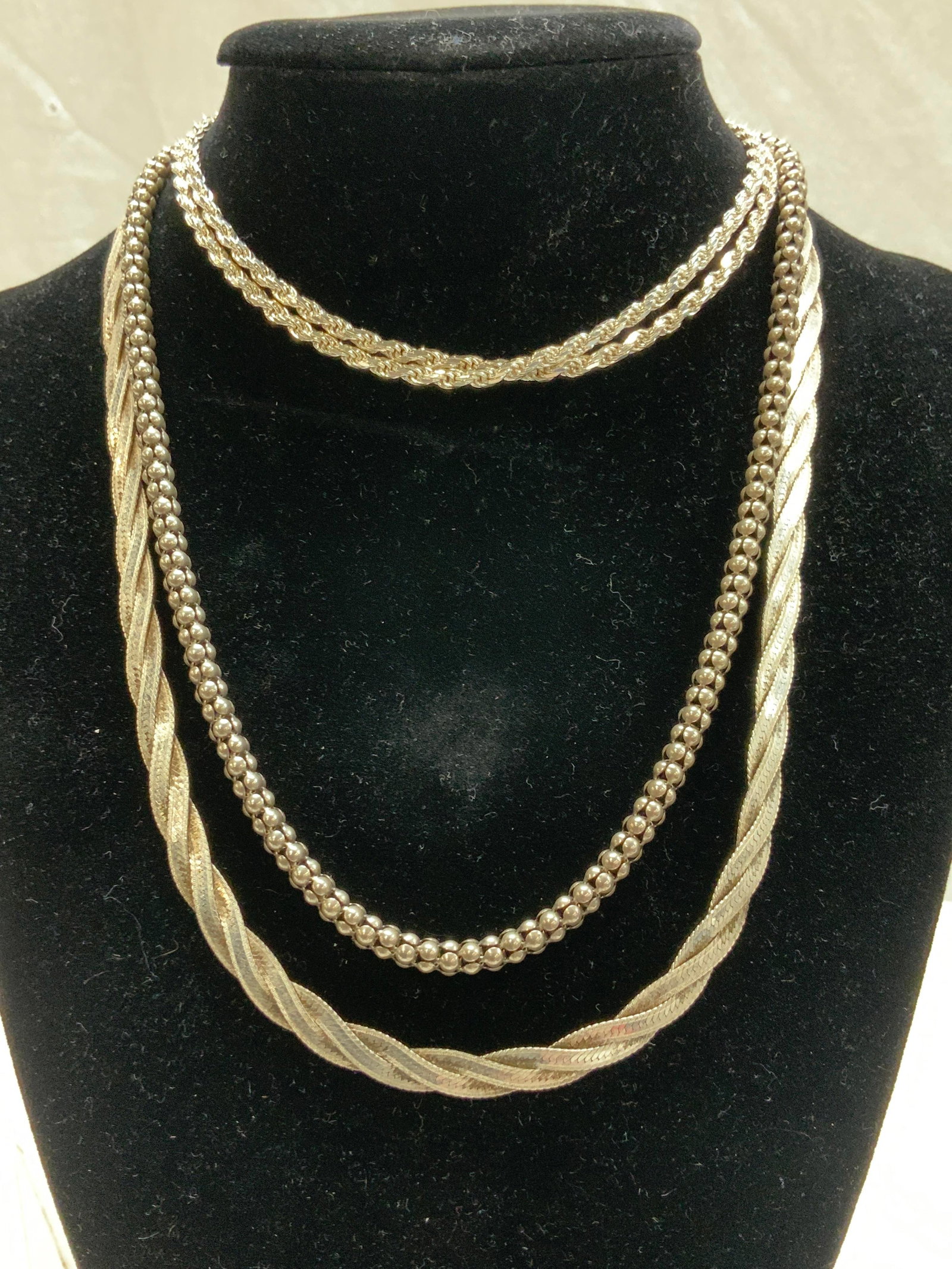 Lot 3 Distinct Sterling Silv Chain Necklaces,Italy: 3 sterling silver necklaces, all hallmarked .925, 1.30 ozt. 2 necklaces additionally hallmarked Italy. Italian Flat braided bone chain, 18 in. L. x 1/4 in. W. Lobster clasp. Italian rope chain with lo