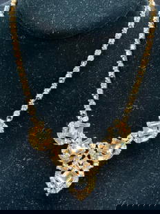 BOGOFF Stamped Bejeweled Choker Necklace: Stamped on clasp Bogoff. Gold metal necklace with faceted clear crystals and light green toned crystals in prong and bezel settings. Approx 6.5 inches long. Moderate wearing to necklace, scratches obs