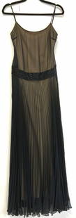 BCBG MAXAZRIA Ankle Length Evening Gown: BCBG MAXAZRIA long ankle length black evening gown. Has the appearance of silk, 100% polyester, flowy gown- this is a great dress for waltzing as the lower skirt with flow through the air. A sheer bla