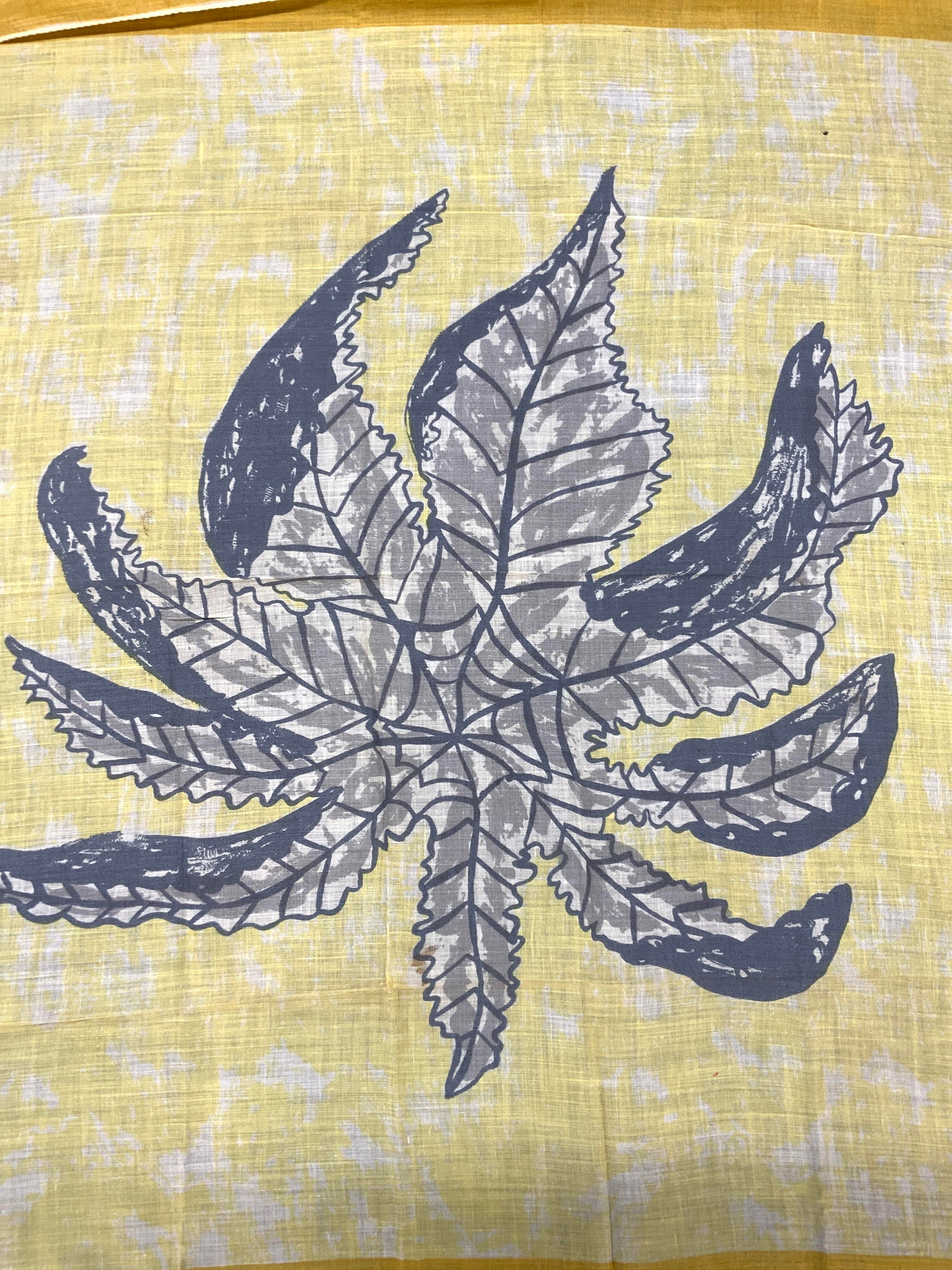 D.d & Leslie Tillet Marked Silk Scarf: Marked on right corner d.d and Leslie Tillet Yellow toned scarf with gray toned flower in the center, possibly silk. Approximately 31 x 34 inches. Evident wearing and tears to scarf and blemishes. D.d