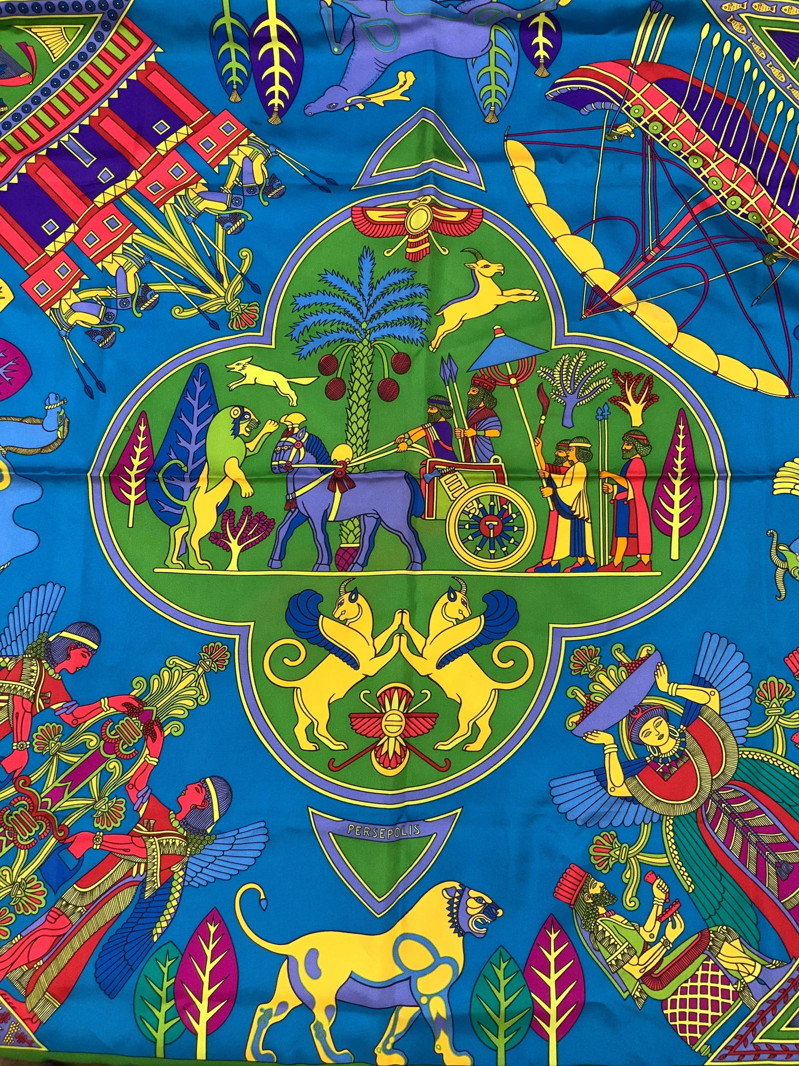 Hermes Sopniek Persepolis Silk Scarf: Marked on scarf Sopniek, Persepolis. Hand rolled silk scarf edges, adorn in mythology creatures and Greco Roman characters in bold colors Approx 35 x 35 inches. Moderate blemishes to scarf. Hermes sil