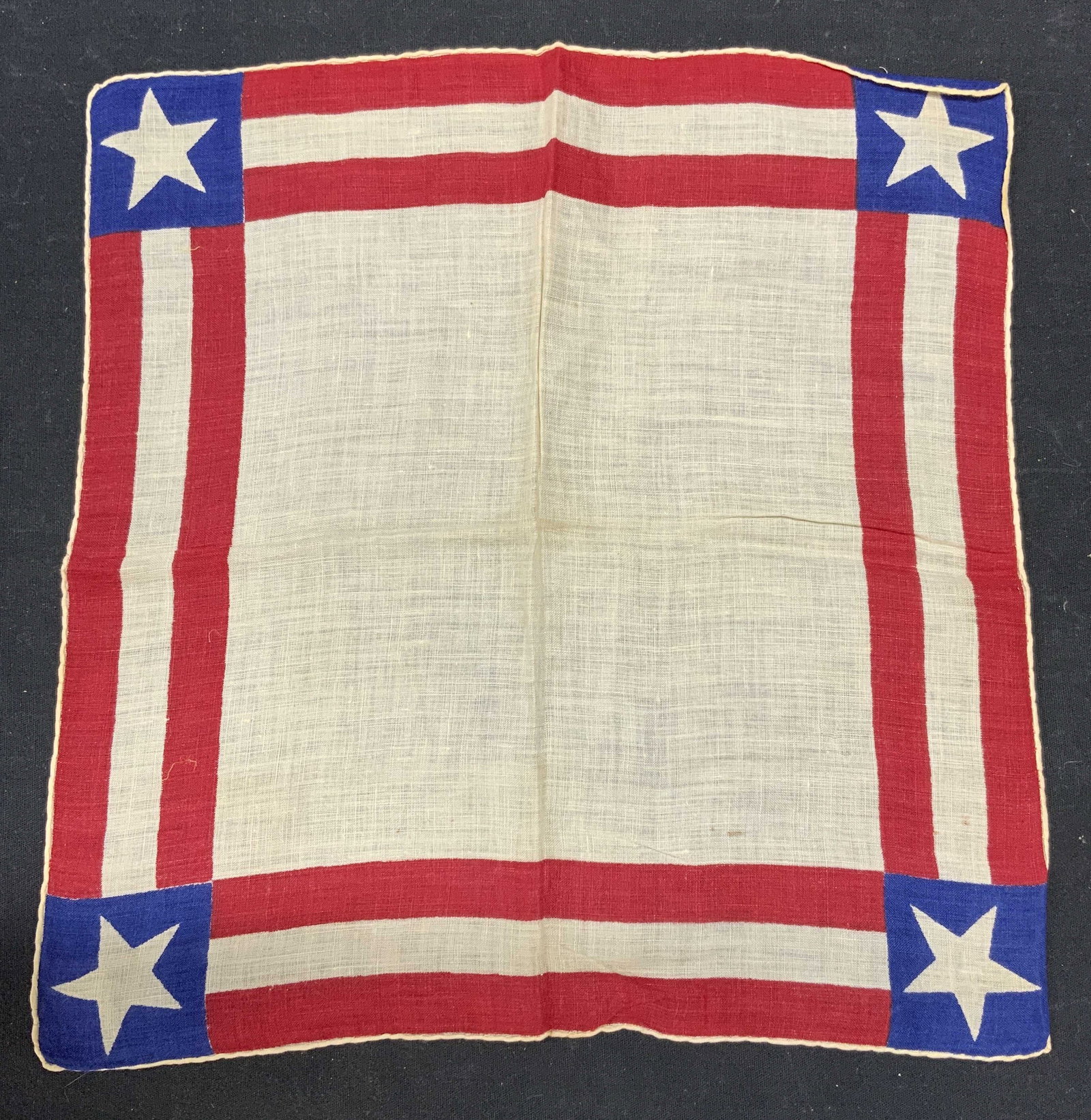 Vintage Stars & Stripes Cotton Handkerchief: Vintage red white and blue Stars and Stripes motif cotton handkerchief. Wear to material consistent with exposure. Measures approx. 12 x 12 inches. Vintage handkerchief, Stars and Stripes handkerchief