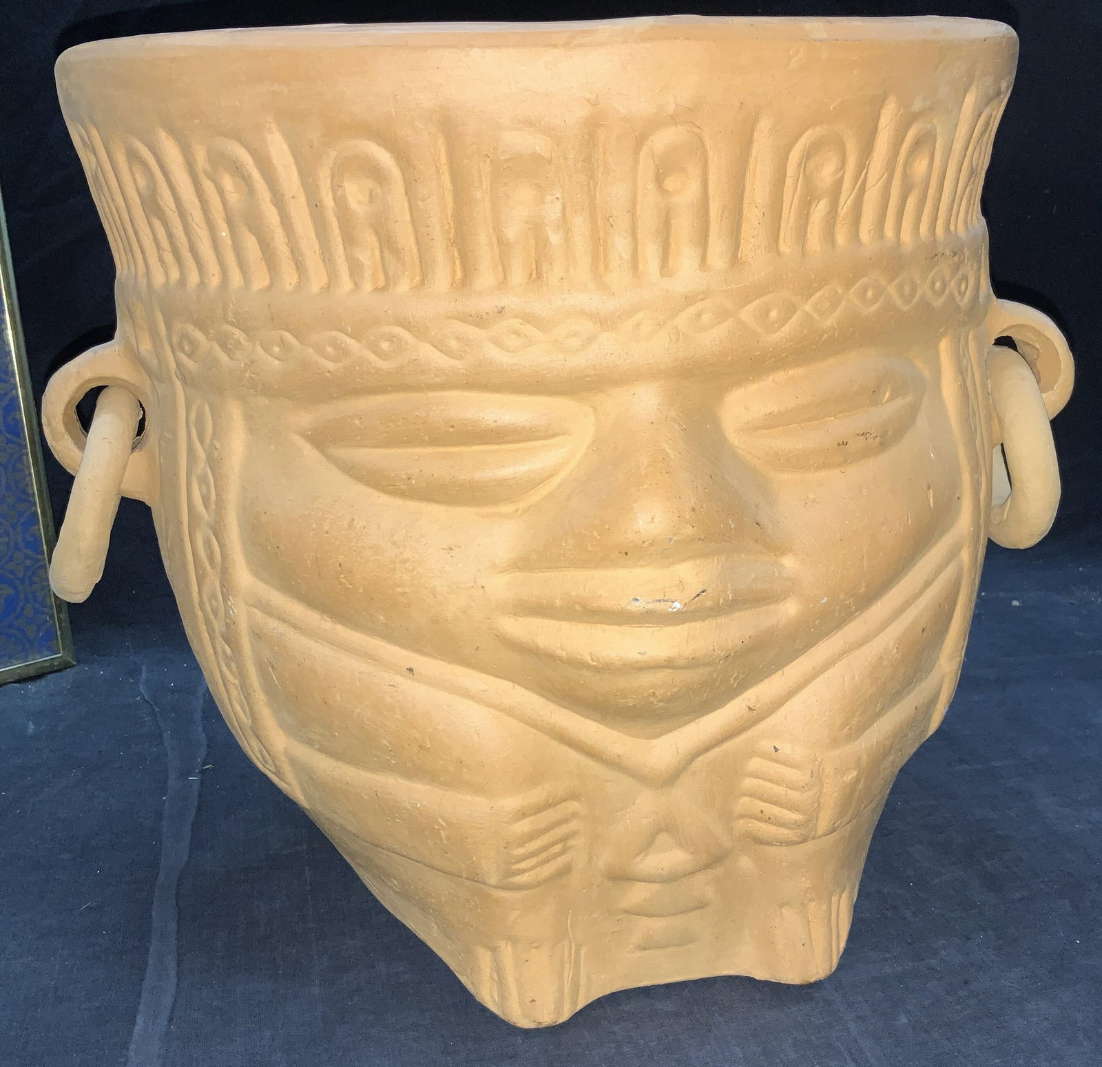 Mesoamerican Terra Cotta Large Planter: Vintage Olmec Figural Terracotta Planter with side ring handles. Impressed designs typical of Mexican cultures. Measures 11 x 12.5 in. Drain hole on bottom. A light crack to rim, light surface wear co