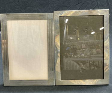 Lot 2 Sterling Silver Picture Frames TIFFANY & CO: Lot 2 Sterling Silver Picture Frames. TIFFANY & Co Sterling Silver Picture Frame. No glass present. Velvet back and two-way easel with metal hinge. Measures approx. 7H x 5W in. Raimond Sterling pictur