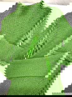 Tunic Metallic Knit Sweater with Rabbit Fur Cuffs: Size Small/ Medium Green knit sweater with green metallic threading . Un labeled , possibly hand knit , feels like cashmere. Has a long tunic shape with flares cuffs and added green rabbit fur to hem.
