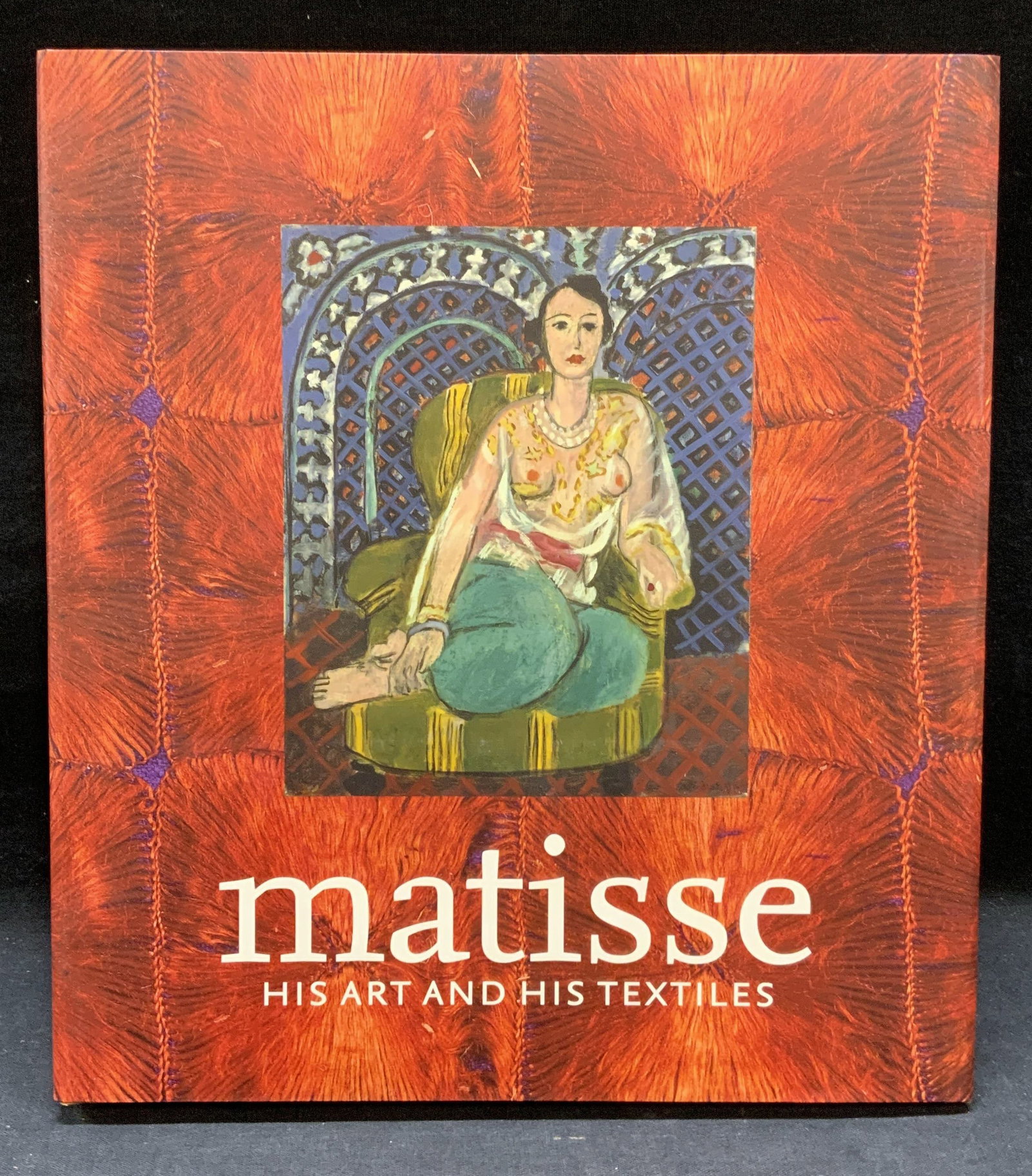 Matisse His Art & His Textiles Book: Hardcover copy of Matisse His Art and His Textiles The Fabric of Dreams. Published by The Royal Academy of Arts, London, 2004. General shelf wear consistent with exposure. Measures approx. 11.25 x 10 