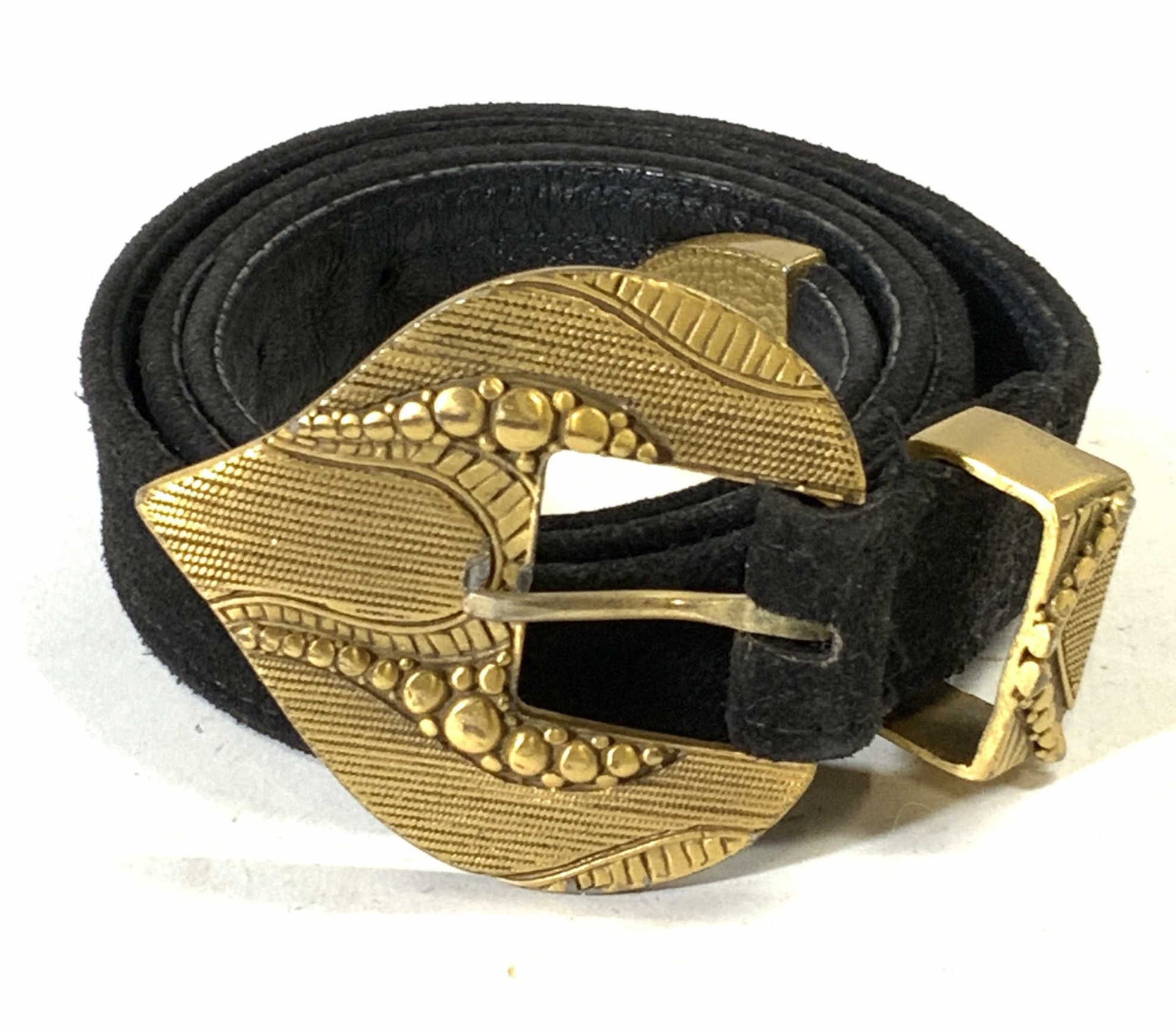 Vintage MZ Suede Belt & Gold Tn Buckle: Vintage signed MZ gold tone belt buckle and black suede belt. Belt measures approx. 37 inches long. Belt buckle measures approx. 2.75 x 2 3/8 inches. Some wear to material consistent with exposure. Si