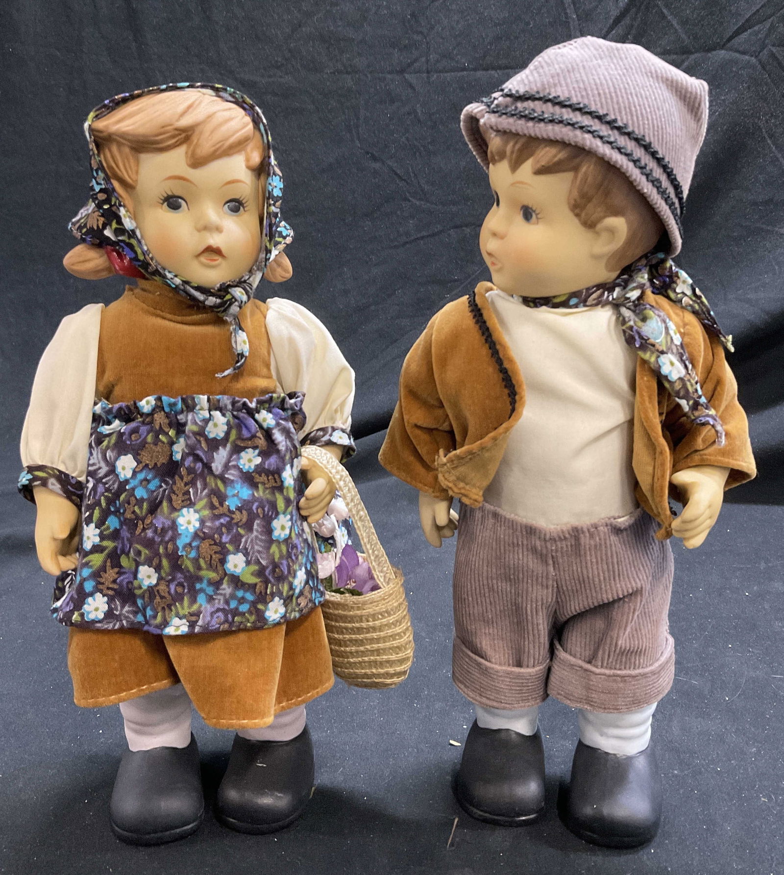 Vtg Hansel & Gretel Bisque Porcelain Figurines: Vintage Hansel & Gretel Hand painted bisque Porcelain string jointed Figurines. Made in Taiwan. Measures approx. 10.5 H x 5 W in. Some surface wear consistent with age and use. tabletop decor, decorat