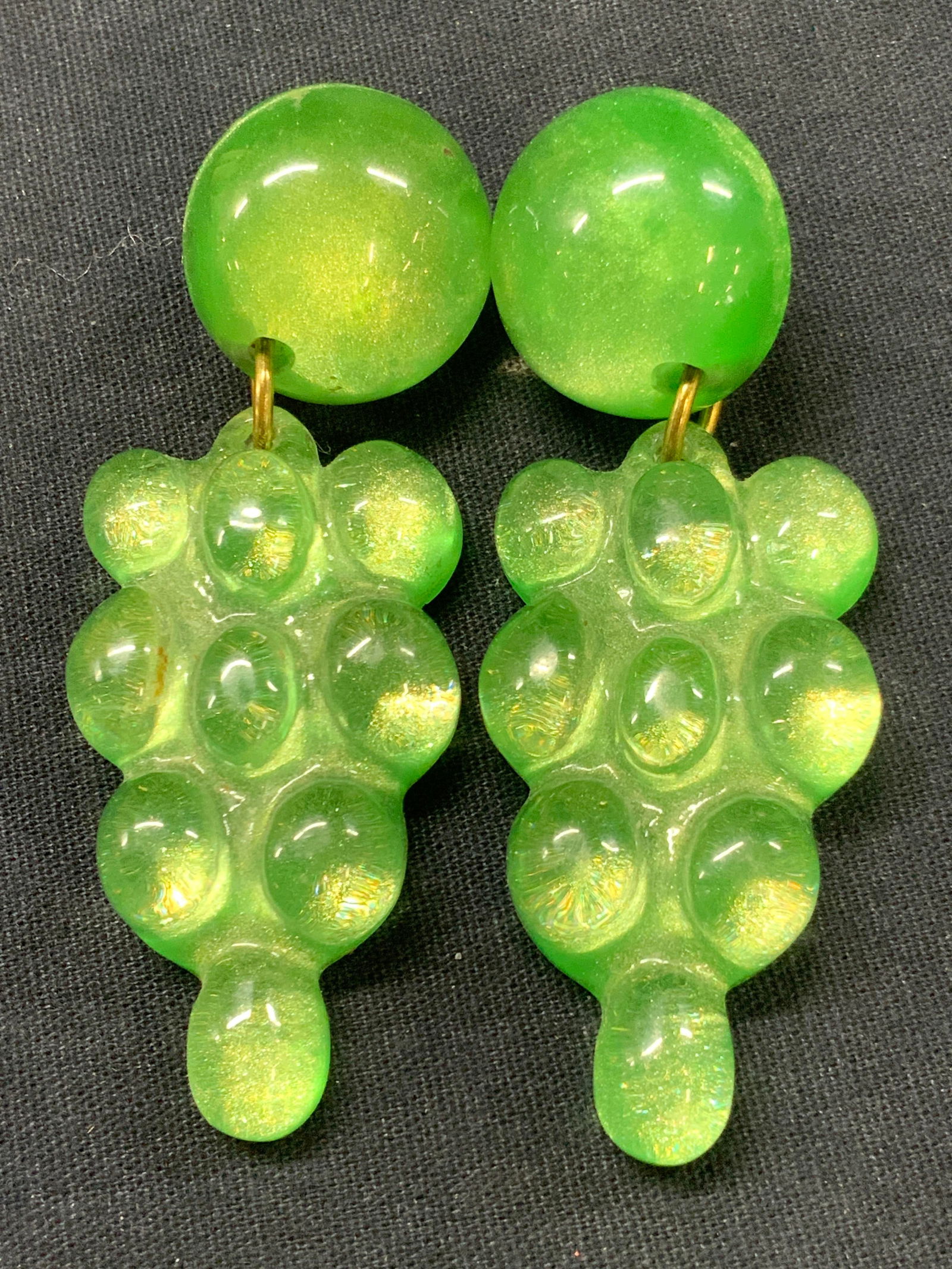 Vintage Lucite Chunky Grape Clip On Earrings: Vintage pair of chunky lime green grape clip on earrings made of composite. Approx 3 inches long. Minor weight. Moderate surface wearing due to age and use. Some scratching observed, Vintage earrings,