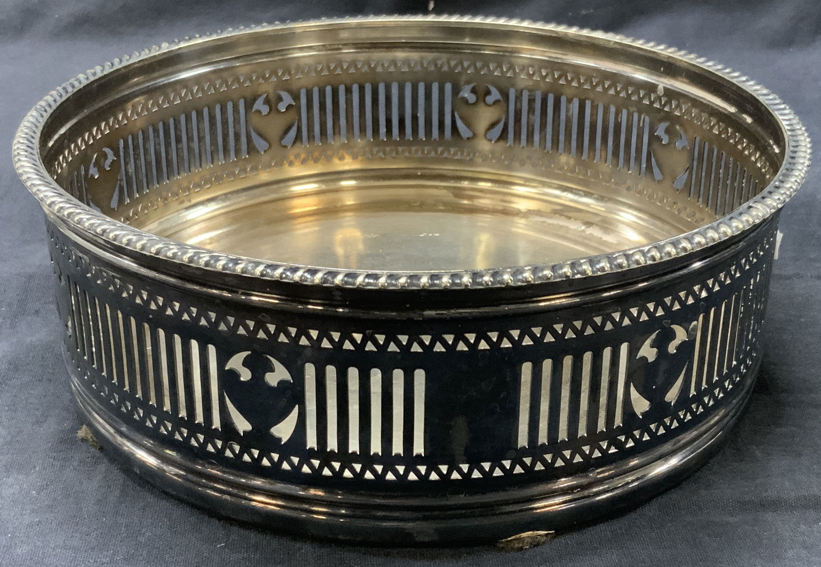 Vntg Gorham Silver Soldered & Plated Platter: Vintage Gorham silver plate platter with side guard. Marked Gorham Silver Soldered. Guard has cut vertical cut outs. Approx 3 inches tall and 8.5 inch Diameter. Moderate discoloration to plating and S