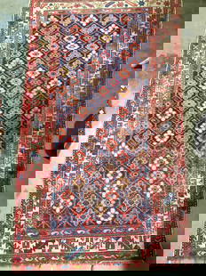 Antique Hand Loomed Persian Wool Area Rug: Hand Woven Wool Area Carpet with Reticulated floral detail with 3 distinct geometric pattern border. End fringes. Colors of red, cobalt, and taupe.measures 33 3/4 x 59 in. Areas where there is more we