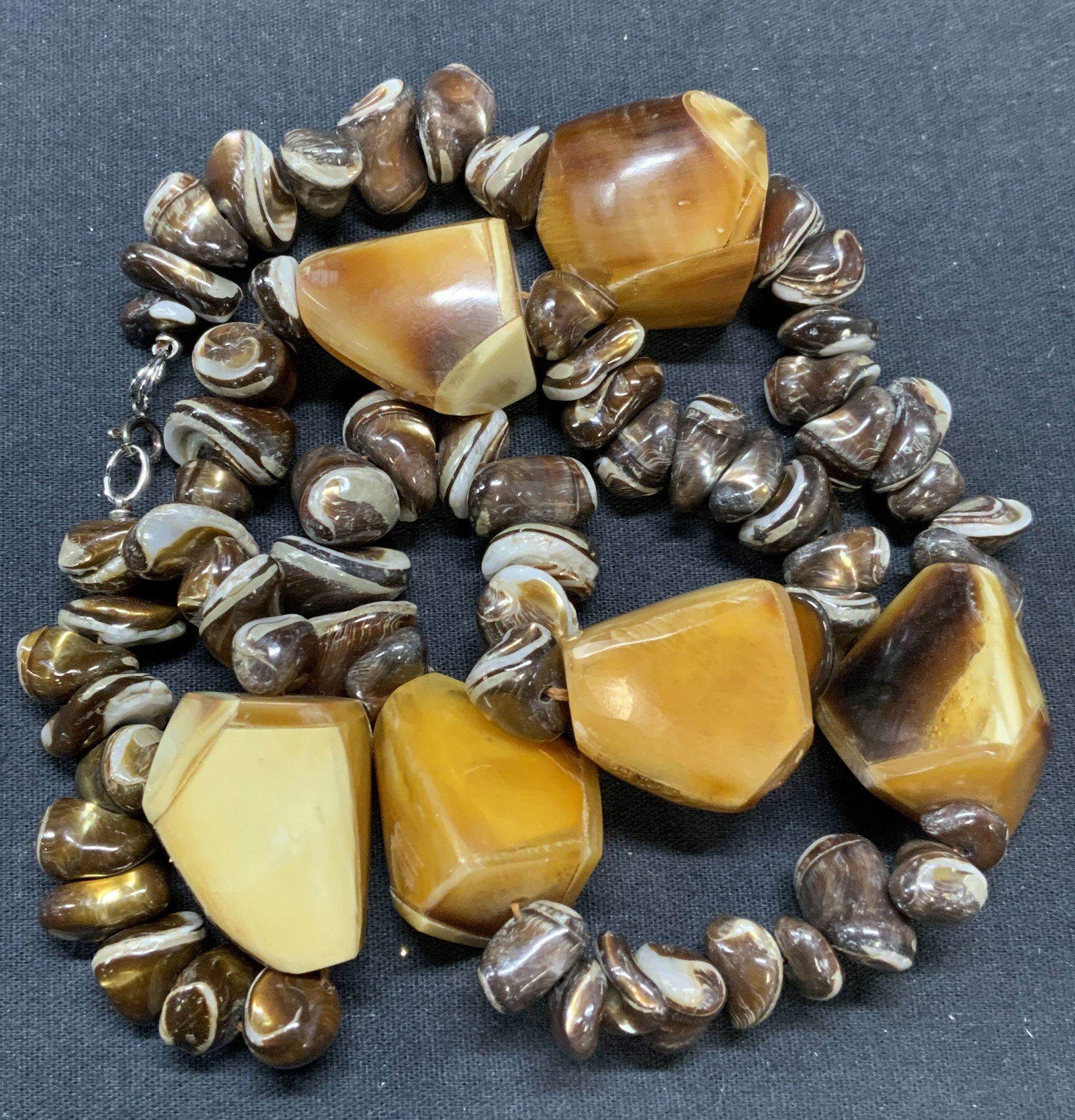 Golden Brown Banded Agate & Bone Necklace: Golden brown metallic banded agate necklace with possibly bone & horn beads. Drop length approx. 13 inches. Some surface wear including scratching observed. Estate jewelry, fine jewelry, fashion jewel