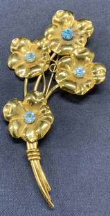 STERLING CRAFT BY CORO Crystal Flower Brooch 4.25i: Vintage Sterling Craft by Coro sterling silver gold vermeil flower brooch with blue crystal decoration. Signed to underside. Hinge pin to underside. Measures approx. 4.25 x 2.25 inches. Total weight .