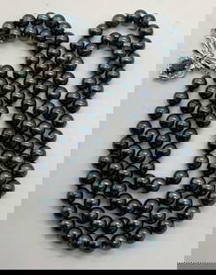 Signed ES Tahitian Pearl 14K Gold Topaz Necklace: Signed ES double strand Tahitian pearl necklace with with 14k gold clasp and topaz gemstone decoration. Deep iridescent blue and purple toned pearls. Signed ES on clasp, marked G 14K on clasp. Drop le