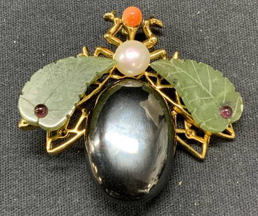 SWOBODA Beetle Pearl, Angel Skin Coral Brooch: Vintage Swoboda gold tone beetle brooch with hematite, green stone, cultured Pearl, and angel skin coral decoration. Signed SWO 99 to underside. Measures approx. 1.75 x 2 inches. Some surface wear inc