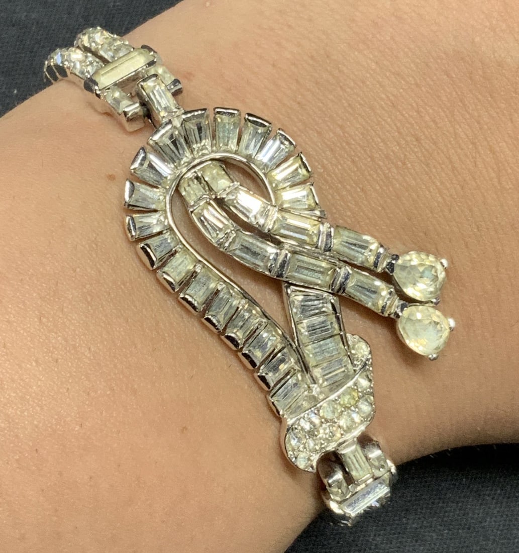 MAZER BROS Silver Tone Crystal Bracelet: Vintage Mazer Bros silver tone and crystal decorated bracelet. Signed on clasp. Circa 1940s. Measures approx. 6.75 inches long. Some surface wear including scratching and discoloration to some crystal