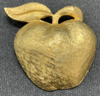 CORO Brushed Gold Tone Apple Brooch: Vintage Coro brushed gold tone apple brooch. Signed to underside. Hinge pin to underside. Measures approx. 1.25 x 1.5 inches. Some surface wear including scratching observed. Estate jewelry, costume j