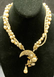 MIRIAM HASKELL Faux Pearl Pendant Necklace: Vintage Miriam Haskell faux pearl multi strand necklace with crescent moon pendant. Signed to underside. Drop length approx. 7 inches, pendant approx. 2.75 x 2 inches. Some surface wear including scra