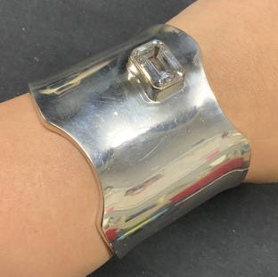 Signed Mexican Sterling Silver Cuff Bracelet: Signed Mexican sterling silver cuff bracelet with clear faceted gemstone decoration. Signed to interior cuff, illegible. Marked 925, Mexico. Measures approx. 2 3/8 inches wide, cuff approx. 2 1/8 inch