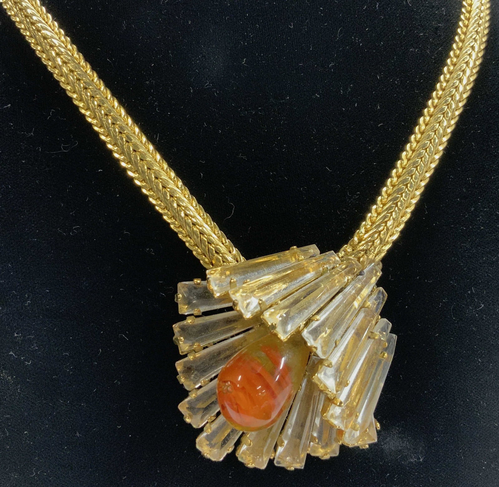 Gold Tn Wheat Chain Necklace w Art Glass Pendant: Adjustable length necklace with Art glass flower pendant . Pendant measures 1.75 in. W & L. Gold tone bone style chain has a wheat pattern link , 1/4 in. Wide. Necklace Drop 6-8 in. Art glass pendant 