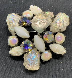 SCHIAPARELLI Opalescent Faux Pearl Brooch: Vintage Schiaparelli silver tone opalescent crystal and faux pearl decorated brooch. Signed to underside. Hinge pin to underside. Measures approx. 2 x 2 inches. Elsa Schiaparelli was the most popular