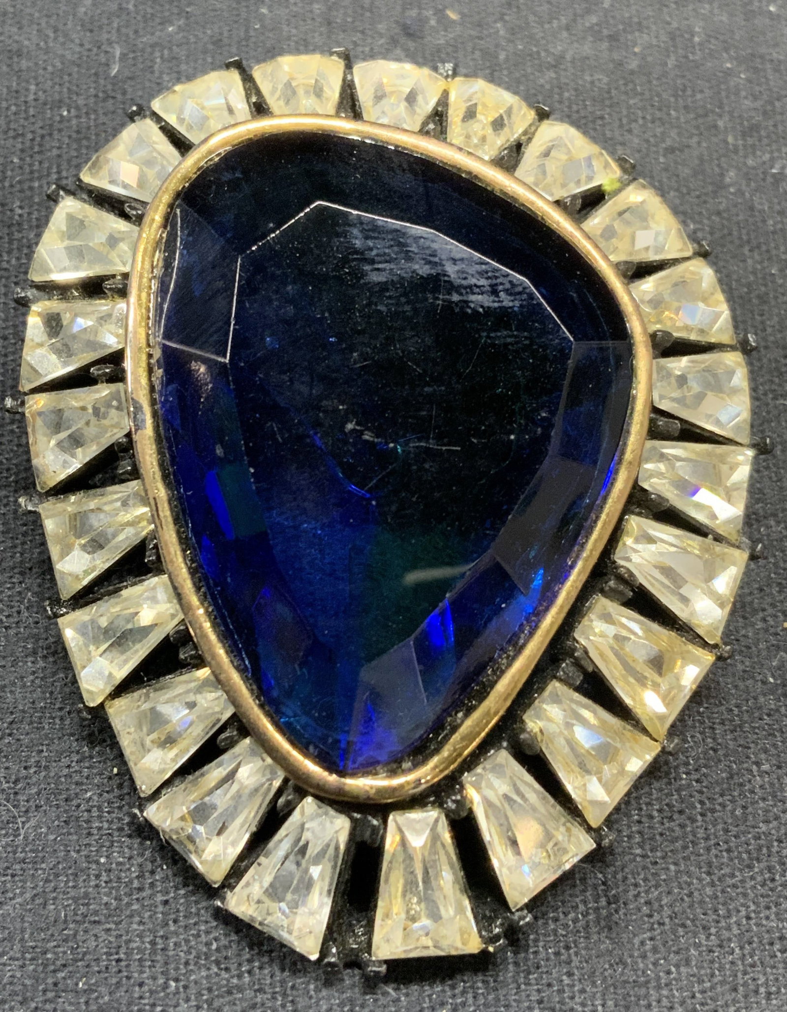 HAR Blue & Colorless Crystal Brooch: Vintage HAR blue and colorless crystal decorated brooch. Signed to underside. Hinge pin to underside. Measures approx. 2.25 x 1.75 inches. Some scratching observed. Estate jewelry, costume jewelry, co