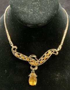 CORO CRAFT Gold Tone Crystal Pendant Necklace: Vintage Coro Craft gold tone orange crystal pendant necklace. Signed to underside. Drop length approx. 5.5 inches, pendant drop length approx. 2 inches. Some scratching observed. Estate jewelry, costu