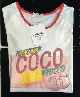 CHANEL Boutique Cotton Viva Coco Tee, NWT: CHANEL Boutique Cotton T Shirt, never worn , new old stock, original tag attached. White with Seafoam blue shirt sleeves and contrasting red collar trim. Wide scoop neck. Print on from reads