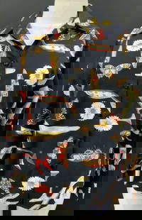 Salvatore Ferragamo Cotton Shirt, Italy: Salvatore Ferragamo vintage long sleeve cotton shirt, black with colorful daisy, shoe, and moth print. Italian size 40. 23.5 in. Long, waist 38-39 in. Very light blemish near button. Made in Italy Clo