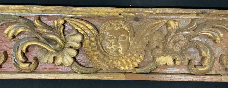 Vintage Ornate Giltwood Wall Ornamentation 8.6ft: Wall ornamentation is vintage possibly antique. Piece has ornate floral, leaf & scroll detail with cherub head in center. Ornamentation is wooden piece is possibly hand crafted. Piece measures approx.