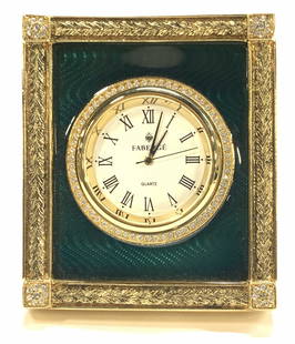 Faberge Guilloche Princess Catherine 24k GP Clock: Singed Faberge Table clock , the Princess Catherine Emerald green French Guilloche and Austrian crystals encased in 24 k gold plated metal frame. This easel back Clock is a representation of elegance