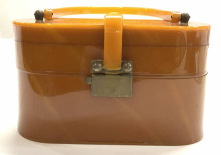 Bakelite Portable Jewelry Box/ Purse w Mirror: Vintage bakelite portable Jewelry box or purse with a carry Handle, latch lifts down to rebel shallow compartment with mirror. brass push latch opens for a deeper compartment,( 1 in depth/ 2.25 in dep