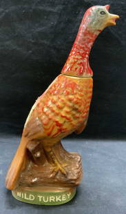 1971 Austin Nichols Wild Turkey Ceramic Decanter: 1971 Austin Nichols Wild Turkey ceramic Decanter. No. 2, Limited edition. Some surface wear consistent with exposure. Measures approx. 6.75 x 4.25 x 13.25 inches. Trademarked on label and underside. W