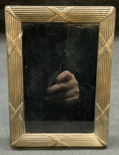 Vintage RC Sterling Silver Picture Frame: Vintage RC sterling silver picture frame. Wood backing. Trademarked on frame, marked 925. Measures approx. 7.25 x 5.25 inches. Scratching and tarnishing observed. Sterling silver, sterling silver pict