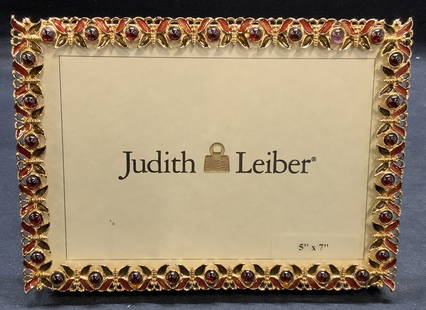 Judith Leiber Enameled Butterfly Frame NWOT: Judith Leiber gold tone enamel and red Cabochon decorated butterfly frame. Trademarked to reverse on metal. Measures approx. 5 x 7 inches. New without tag. Some scratching blemishes observed. Judith L