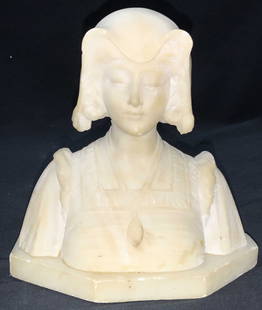 Vintage Carved Marble Female Bust Sculpture: Vintage, possibly antique carved marble bust of an Italian woman with bonnet over her hair, she looks down with a stoic look, has ruffles on her shoulders and a necklace that hangs from her neck. Appr