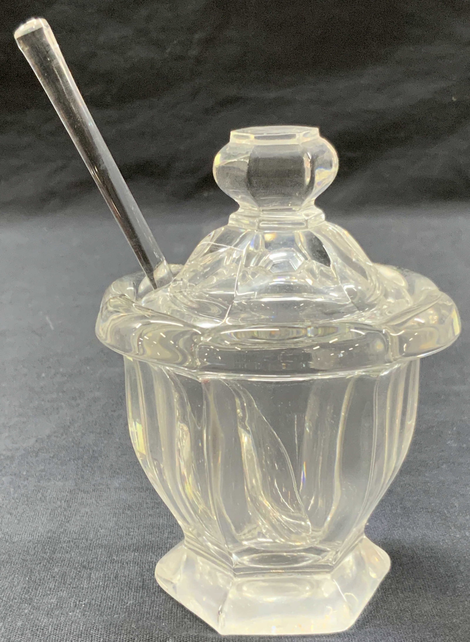Baccarat Clear Crystal Sugar Bowl W Spoon, France: Stamped on underside Baccarat, France Clear cartel made sugar bowl with top lid and spoon approx 4.75 inches tall and 3 inch diameter. Spoon is also marked with Baccarat stamp on cup, approx 5.5 inche