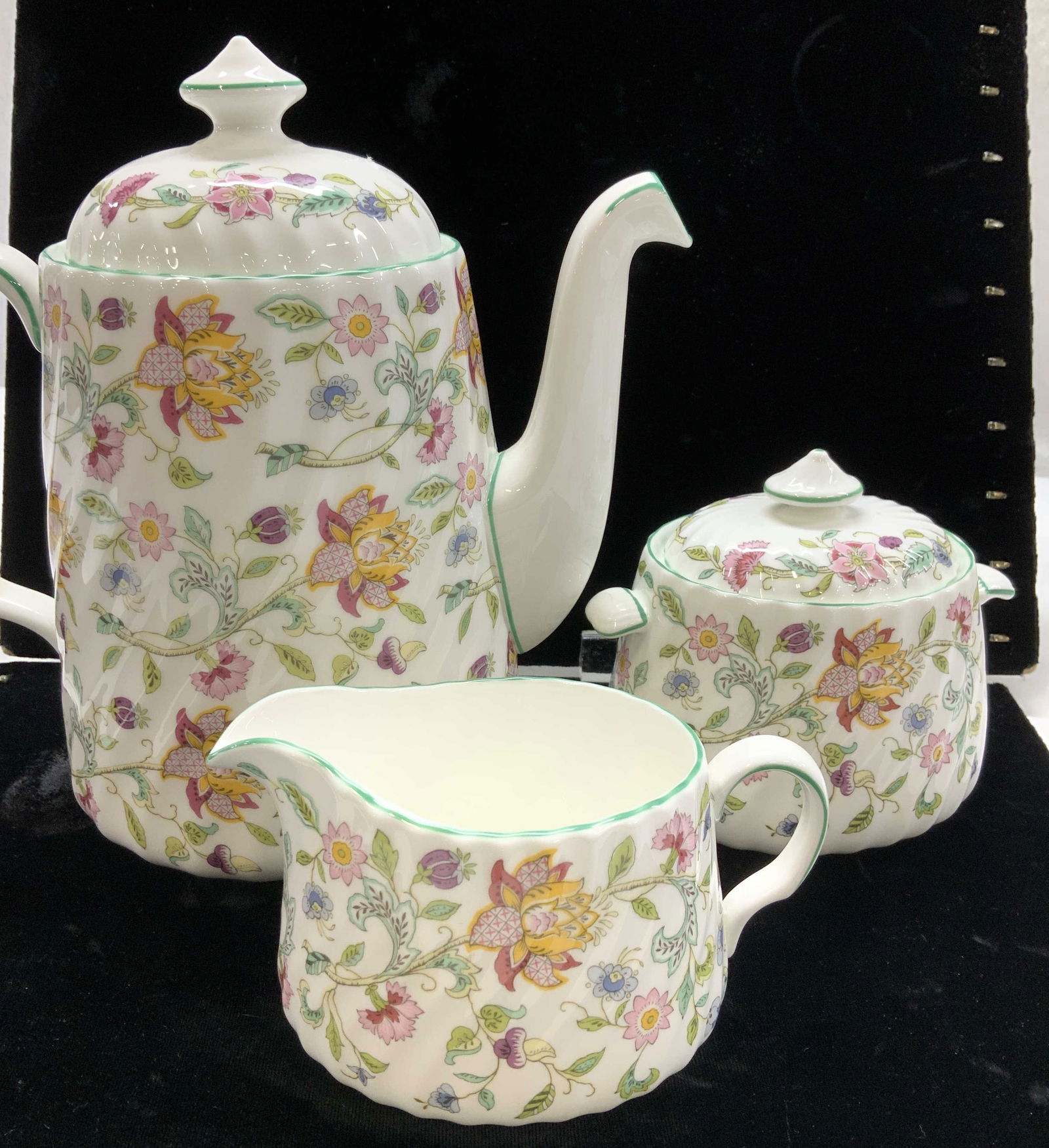 Minton Haddon Hall Porcelain Serverware, 3 England: Bright white porcelain with French country florals. Minton Haddon Hall Pattern # B 1451 , creamer, sugar bowl with lid and coffee pot with lid. Designed by John William Wadsworth (1879?1955) and signe