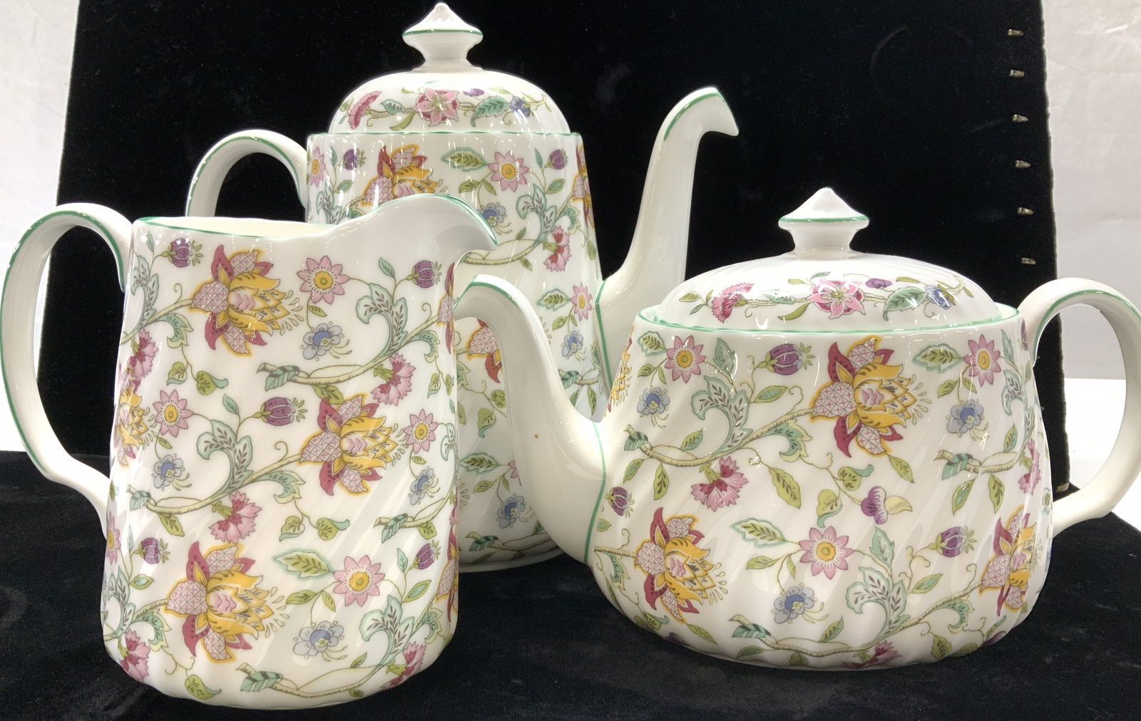 Minton Haddon Hall Porcelain Serverware, 3 England: Minton Fine Bone Porcelain Coffee Pot with lid, Tea pot with lid, and large milk pitcher.Bright white porcelain with French country florals. Minton Haddon Hall Pattern # B 1451 .Designed by John Willi