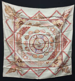 HERMES France Tan Rocaille Silk Scarf, 1999: The Hermès Rocaille Scarf by designer Valerie Dawlat Dumoulin , c. 1999. Featuring Hand rolled edges, tan with pink and coral colored sea shells , Signed ‘Rocaille HERMES PARIS ‘ Length: 34 in. W