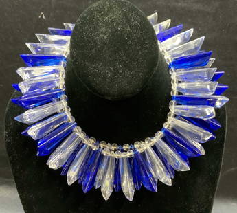 Blue & Colorless Crystal Statement Necklace: Blue and colorless crystal beaded double strand choker necklace. Measures approx. 12 inches long. Crystals measure approx. 1.5 inches long. Some scratching observed. Property of Manhattan estates and