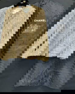 CHANEL France Tweed Spring 2006 Evening Jacket: CHANEL France Tweed Boucle Collarless Jacket , from the Spring 2006 Collection. Made in France Size 48. Multi color Boucle Fringed Jacket with hints of metallic, buttoned patch pockets, beige silk lin