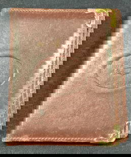 Cartier Leather Compact Mirror Card Folder, Paris: Marked on interior, a gift from Cartier, Paris A maroon toned leather card holder with one side with a compact mirror on the interior and card pocket on other side. Stamped on cover and interior with