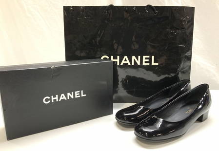 CHANEL Patent Leather Shoes w Box/Bag Italy: Chanel PARIS black patent leather low heel shoes that comes in a Chanel shoebox with a Chanel bag. Product number 08A1 J G26216. Shoes are Made in Italy, size 42 ( 12B). Rubber heel and sole with gold